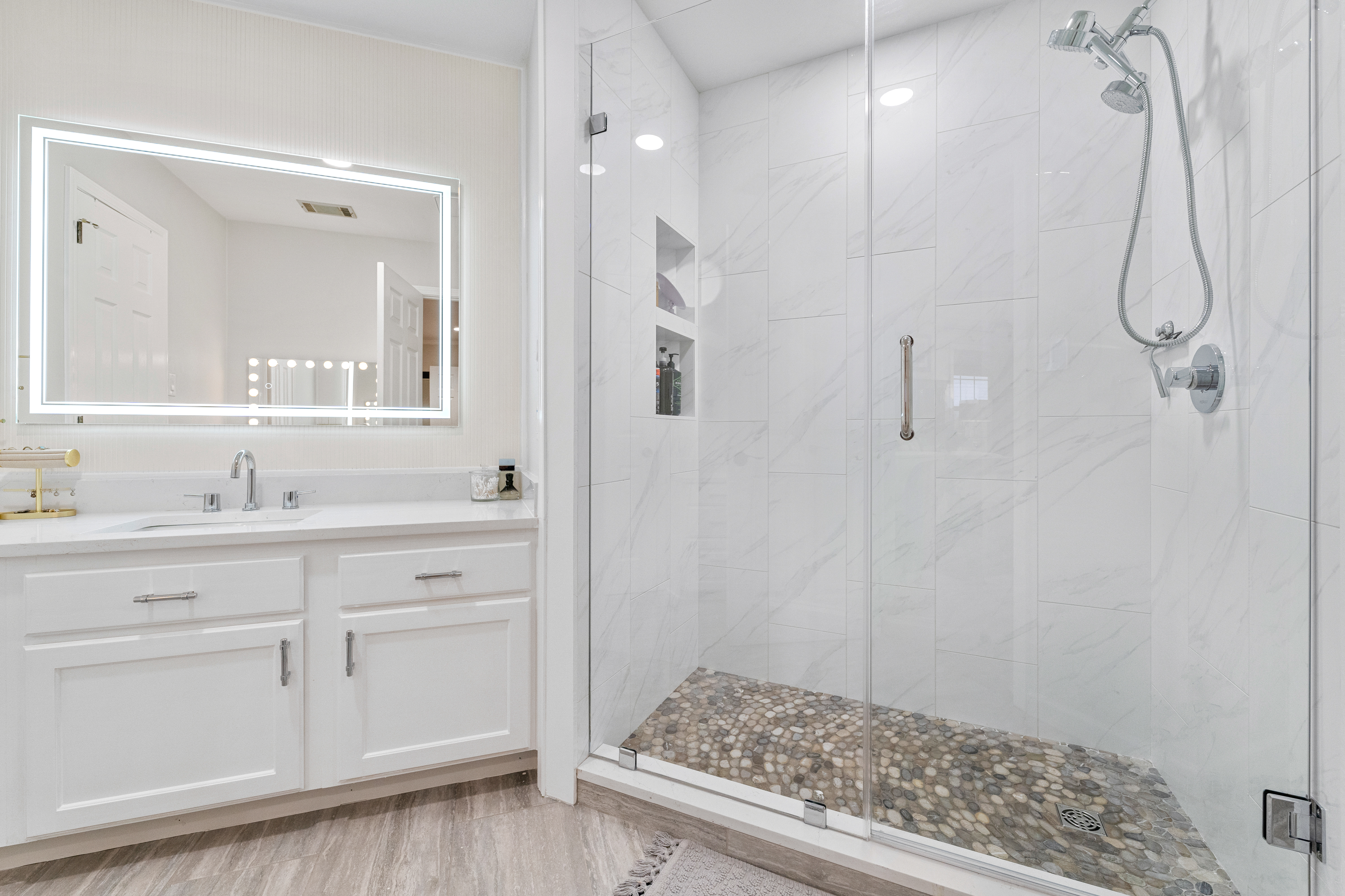 Master bathroom renovation with tile shower and soaking tub